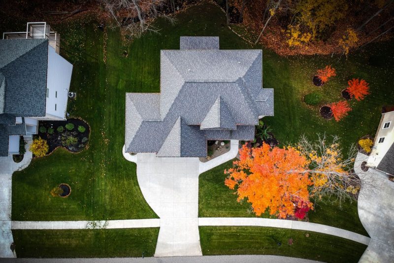 aerial image of roof with grey shingles in Fall