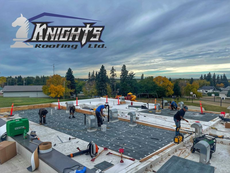 Knights Roofing flat roof repair team